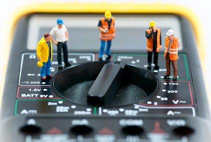 Team of Engineering on a Multimeter